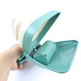 Pet's Poop Scooper with bag attached